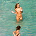 Naked girls swimming